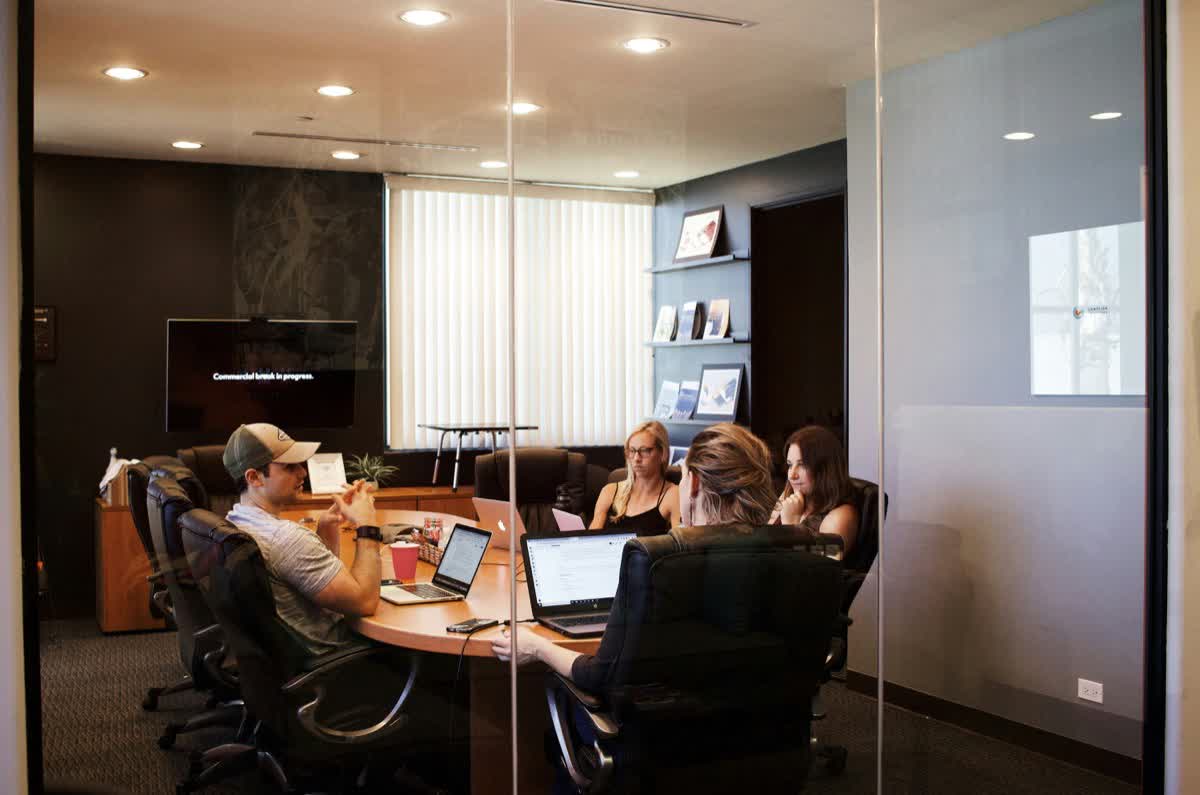 Team collaborating in a modern meeting room